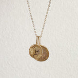 Waved Disc Imprint Pendant