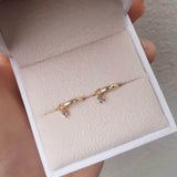 Dainty Tanzanite Huggies